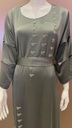 Green dress embellished with an intricate silver beaded design