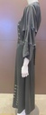 Green dress embellished with an intricate silver beaded design