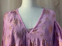 Radiant and intricately designed pink dress,