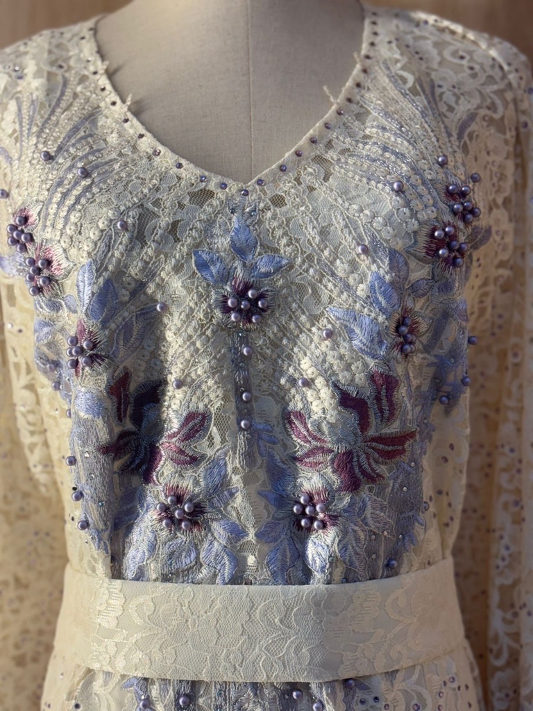 Elegant yellow dress embellished with beads 