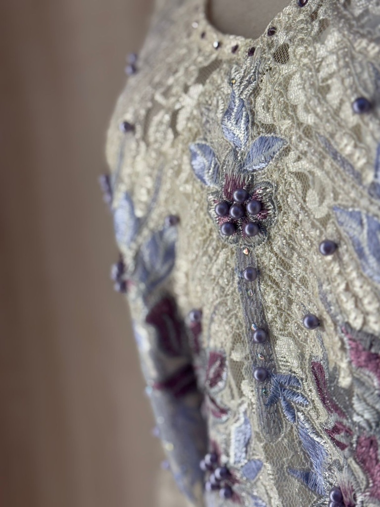 Elegant yellow dress embellished with beads 