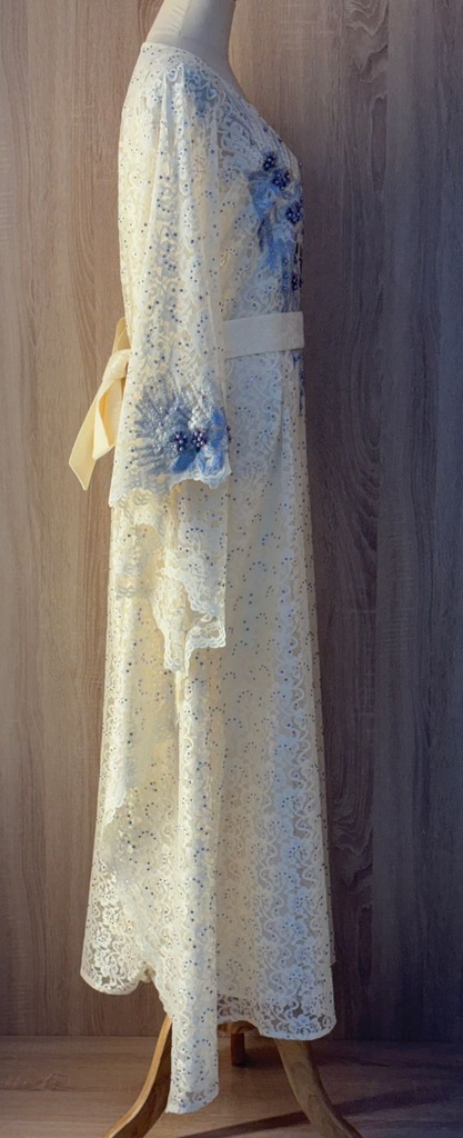 Elegant yellow dress embellished with beads 