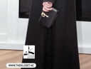 Golden snake black clutch