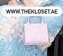Stones studded handbag