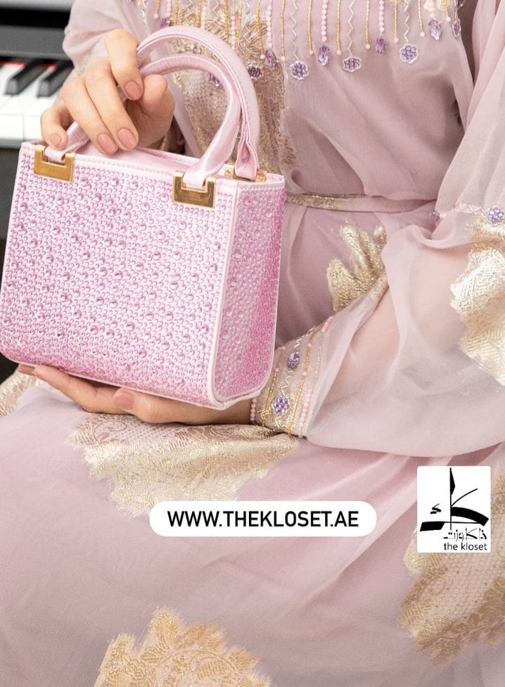 Stones studded handbag