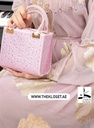 Stones studded handbag