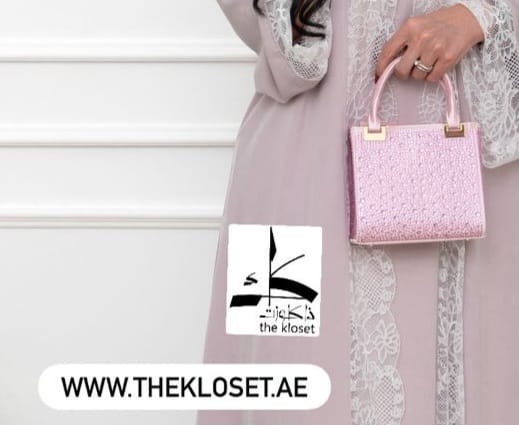Stones studded handbag