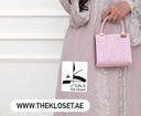 Stones studded handbag