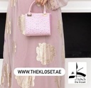 Stones studded handbag