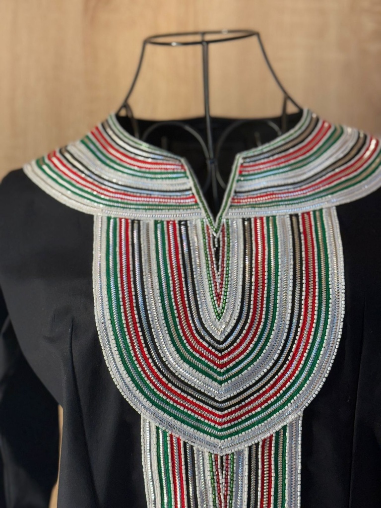 National day dress handcrafted with traditional Talli work