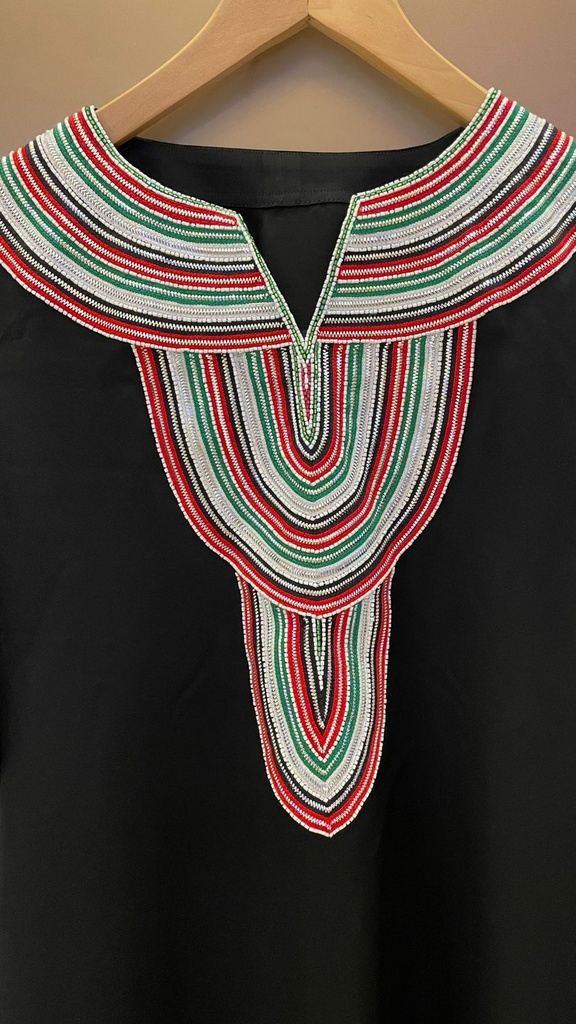National day dress handcrafted with traditional Talli work