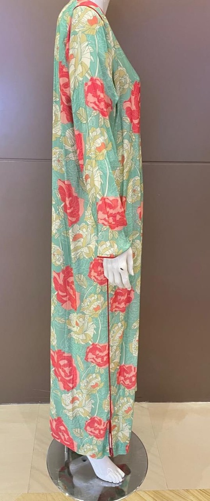 Green Dress Featuring Floral Designs