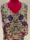  Beautifully embellished dress featuring an intricate floral print 