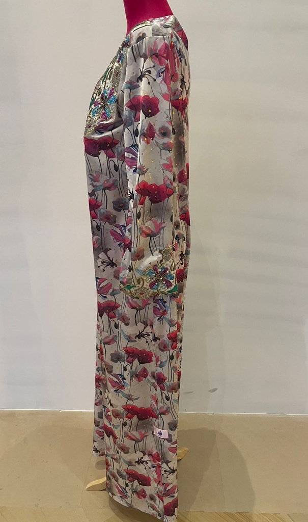  Beautifully embellished dress featuring an intricate floral print 