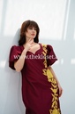 Burgundy embroidered dress with lantern sleeves and floral design
