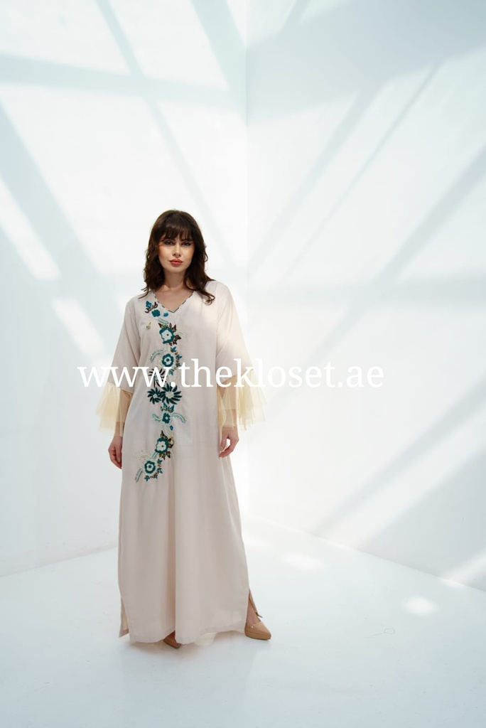 Long Dress Decorated With Delicate Embroidery