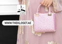 Stones studded handbag