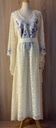 Elegant yellow dress embellished with beads 