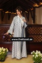 Classic white shirt and a black Small polka dot skirt & reversible abaya  