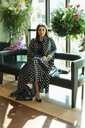 Classic black shirt and a white small polka dot skirt & reversible abaya 