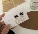 Pearl loop bow earrings
